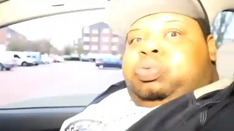 Big Narstie laughing with shoulders shaking during GRIME REPORT interview, 2014