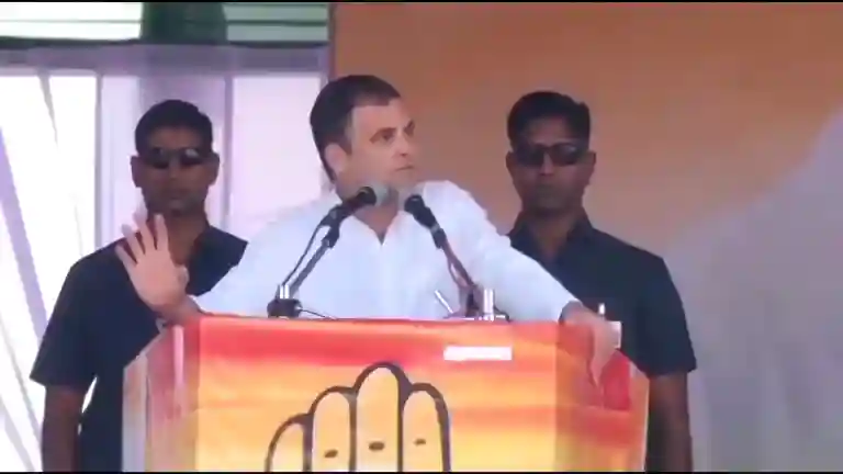 Rahul Gandhi smiling and gesturing while saying goodbye sequence at Latur rally in 2019
