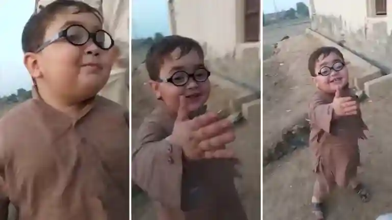 Muaz Baloch, the young Pathan boy, looking at camera with a curious smile while saying Piche dekho